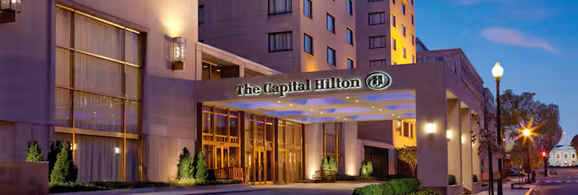 The Capital Hilton exterior at night