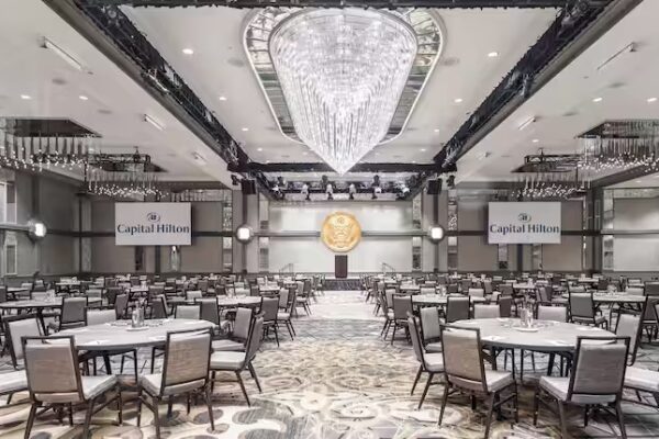 The Capitol Hilton Presidential with sables and chairs