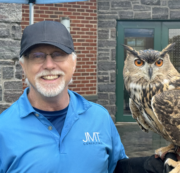 JMT team member with owl