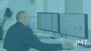 A nonprofit CFO/finance leader looking at a modern financial dashboard